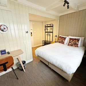Kamer met een Queen Size Bed